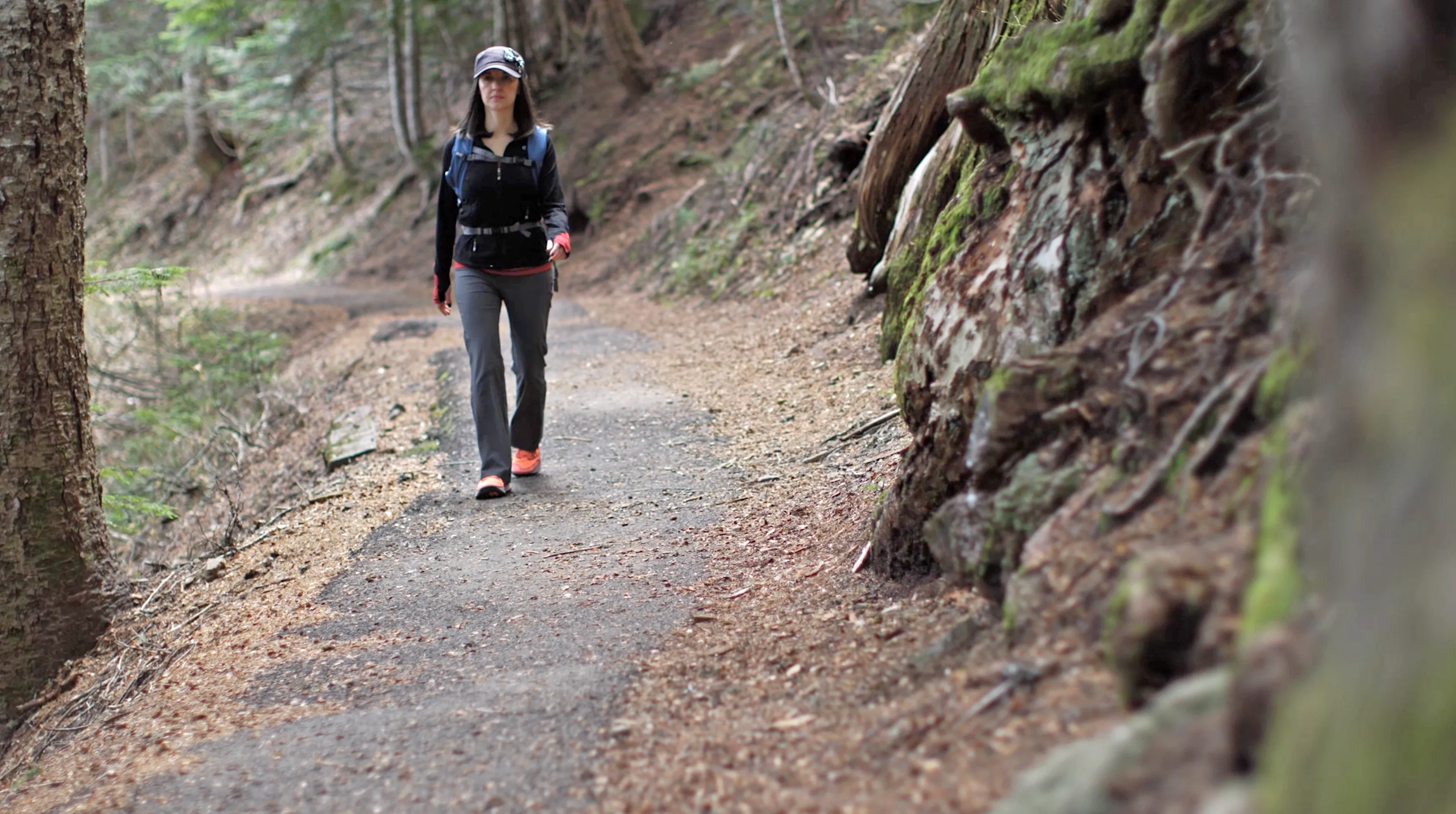 Frame from a patient story featuring Sarah outdoors