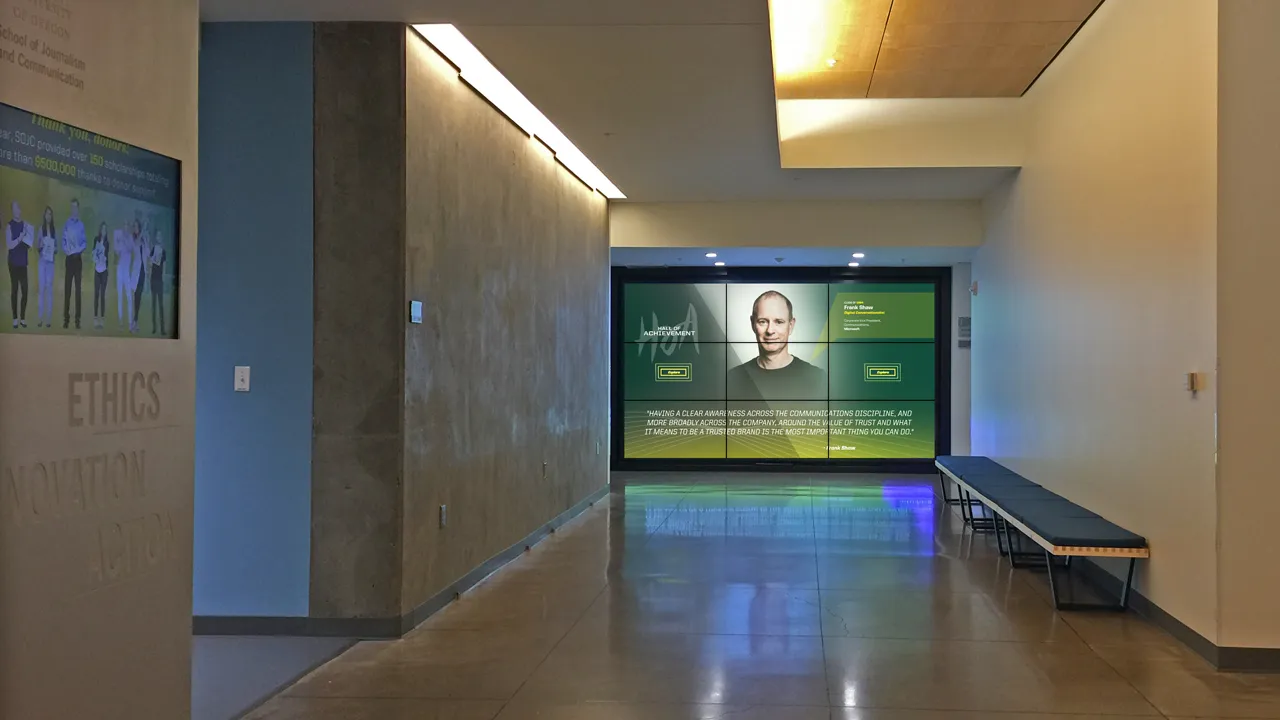 The 14-foot interactive video wall installed at the SOJC Hall of Achievement
